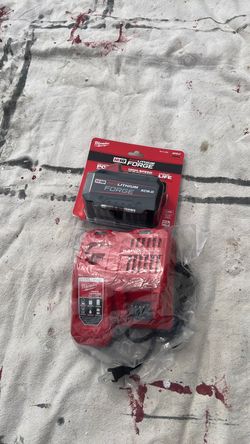 Milwaukee battery.  XC  8.0  Forge and. Rapid. Charger