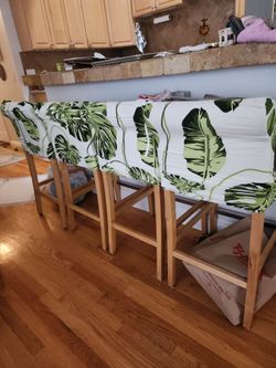Counter chairs with covers (set of 4)