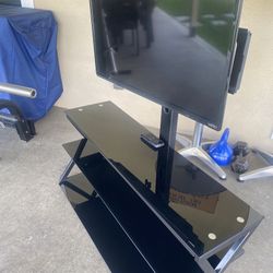 TV STAND WITH VIZIO 32”tv.