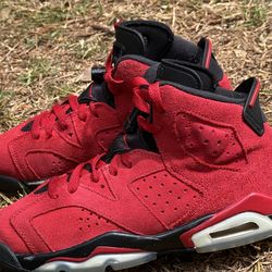 Nike Air Jordan 6 Retro "Toro Bravo" is a vibrant red sneaker featuring a bold all-suede upper 4.5y