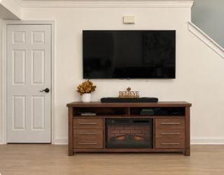 TV stand with additional electric fireplace insert added