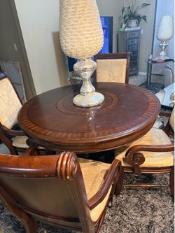 Beautiful round wooden table set