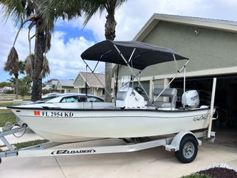 1998 Palm Beach 16’ boat with a 2022 Suzuki 60hp engine with a warranty