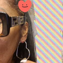 Costume jewelry, heart shape earrings pierced.