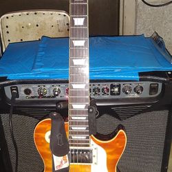 Samick Avion 3 Les Paul style guitar And 75 Watt Modeling Peavey Vypyr Amplifier 