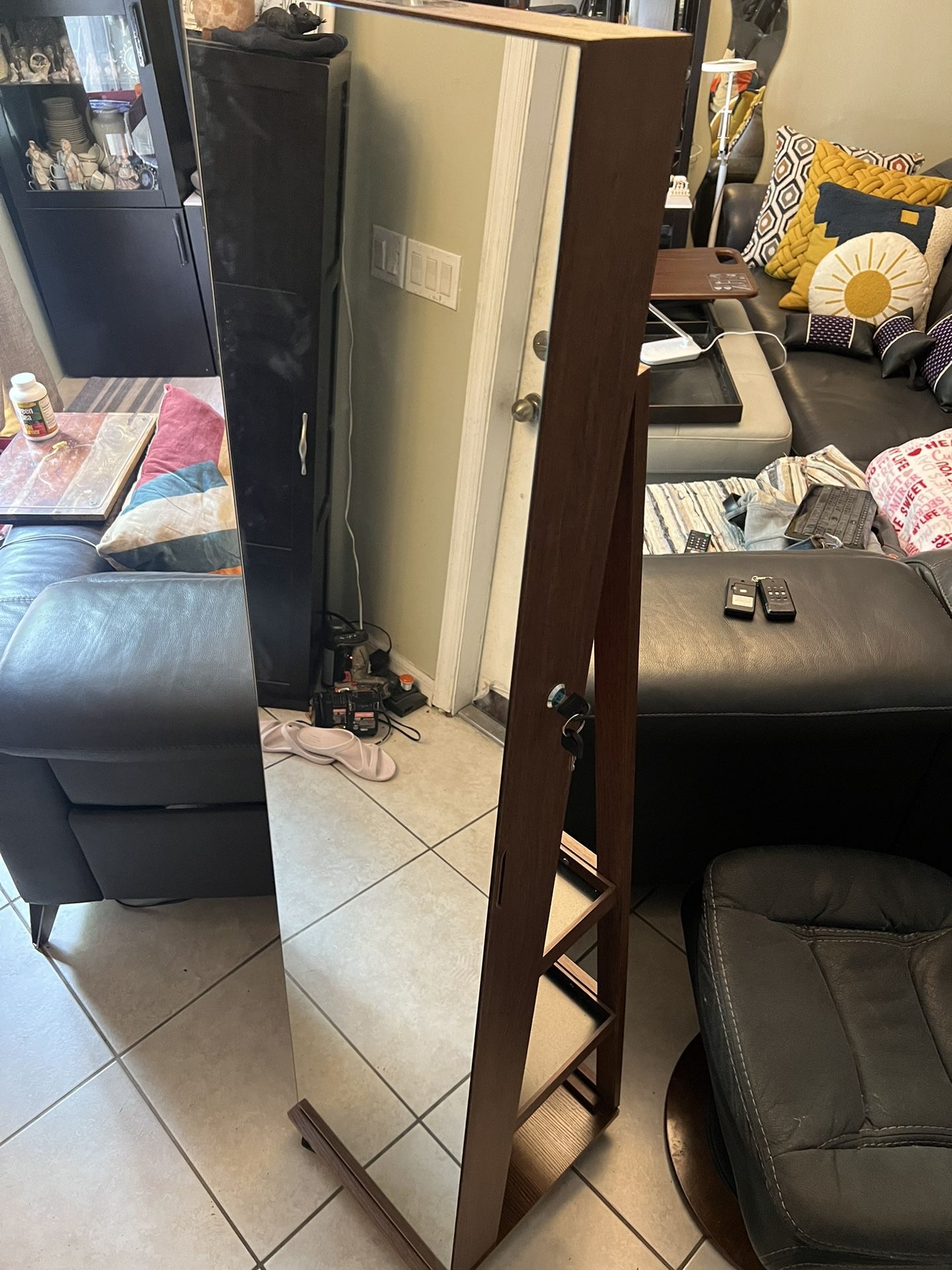 Swivel jewelry mirror storage with shelves