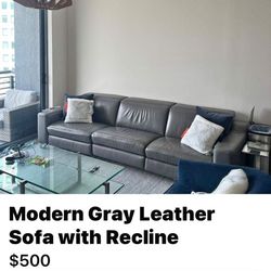 Leather Sofa And Glass Coffee Table 