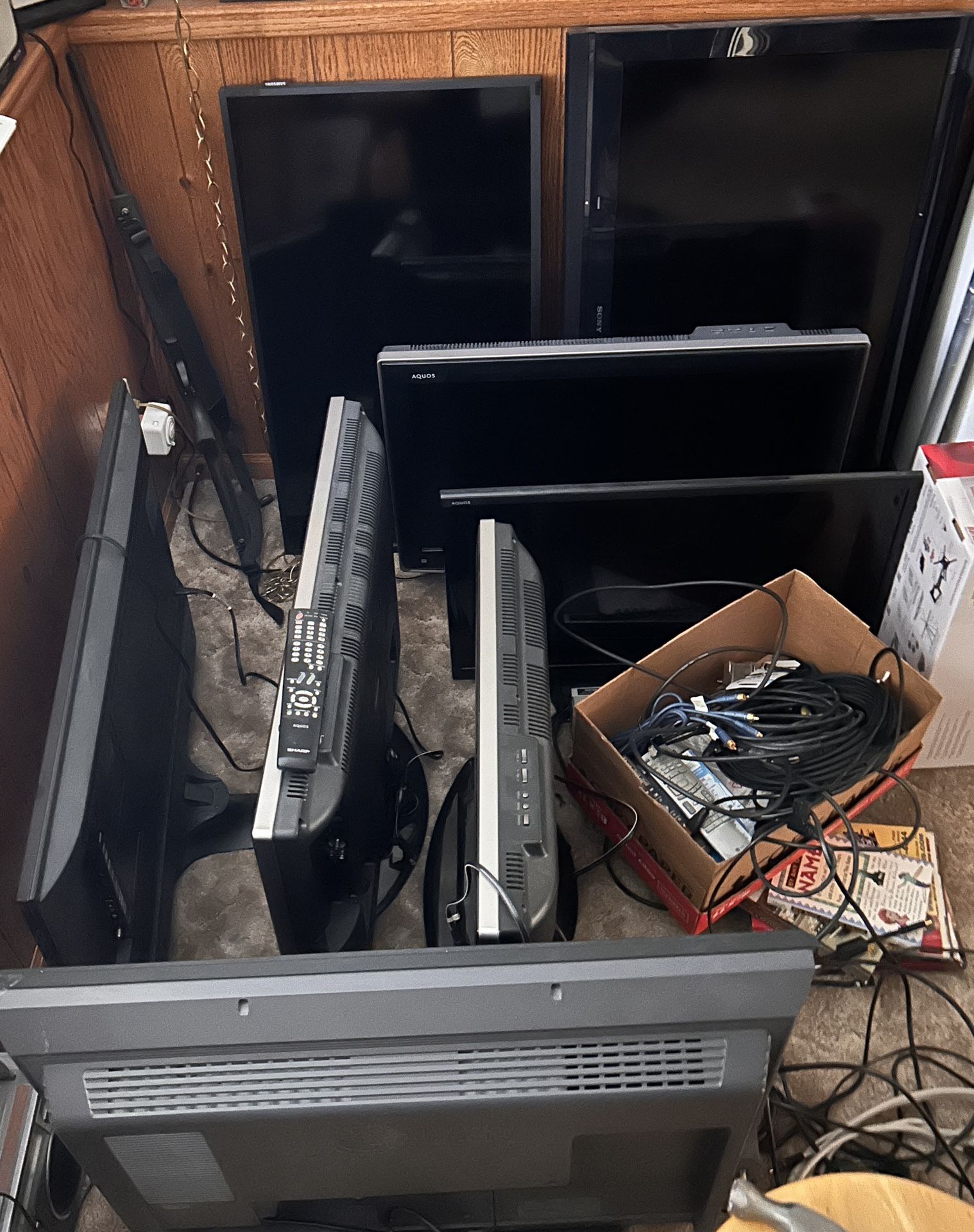 7 Flat Screen tvs & 3 dvd/vcr combos 