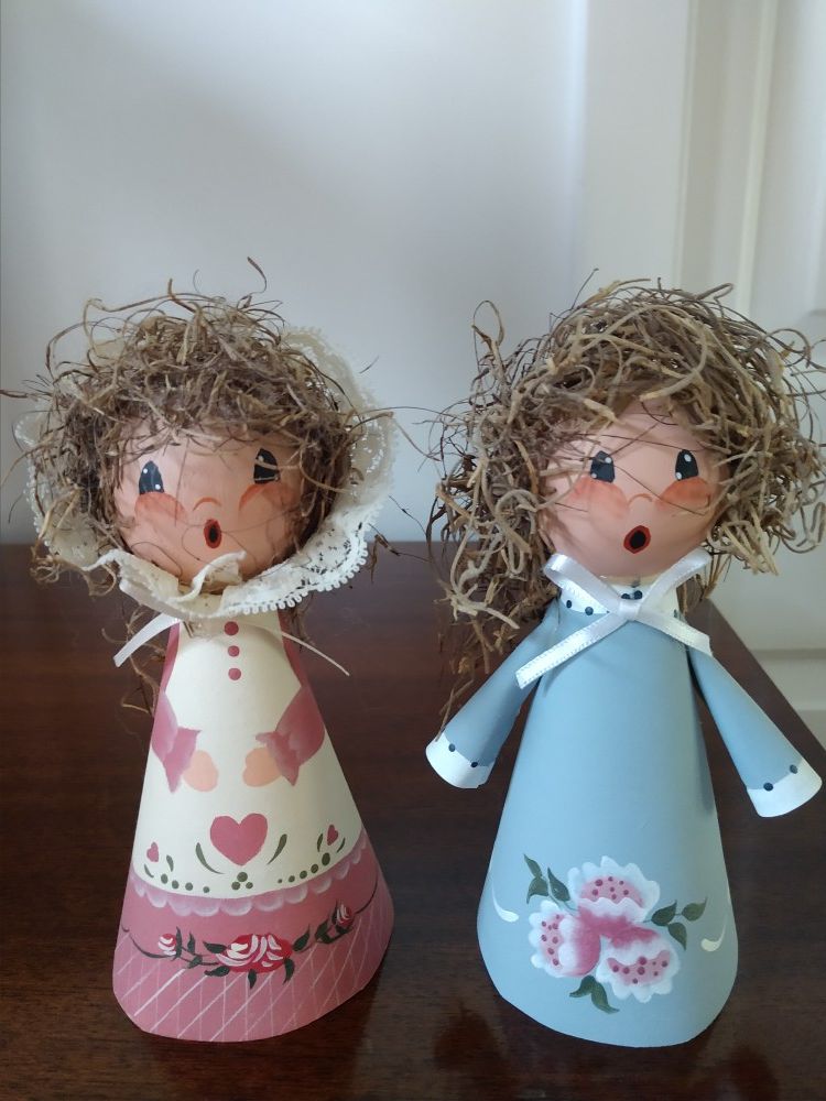 Pair of hand painted girls