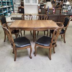 Dining set. Includes table and six chairs