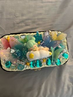 handmade decoden jewelry box. The black case inside has a mirror and places to store jewelry.