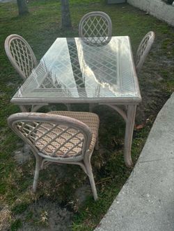 Vintage Rattan Table Set With 4 Chairs & Glass Top