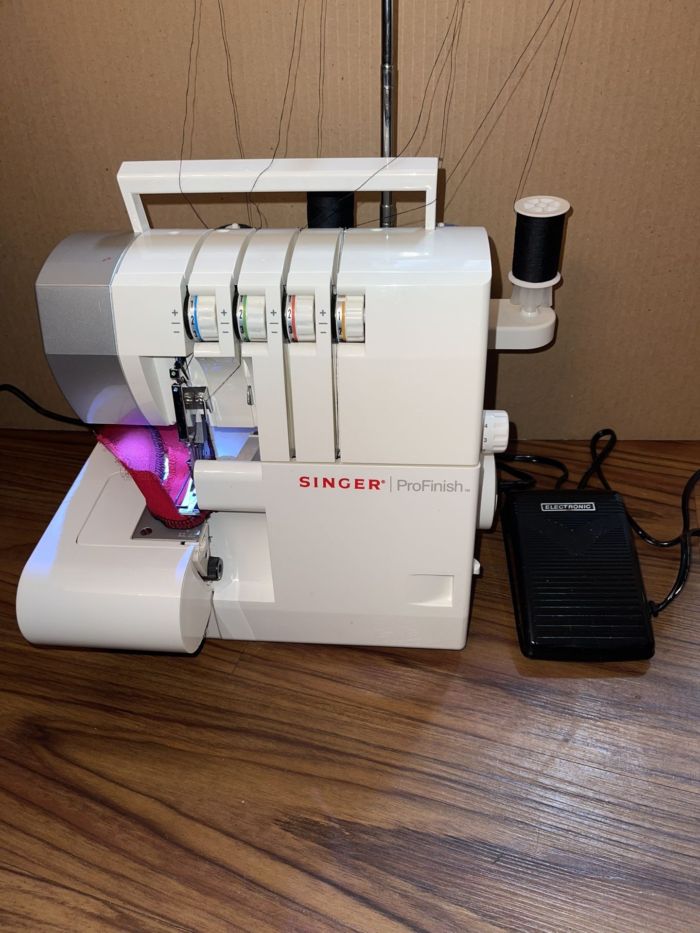 Singer ProFinish Sewing Machine Serger 14CG754 Working Good. You Can use 2 , 3 or 4 Threads for a Variety of Stitch Combinations. $200 Firm On Price