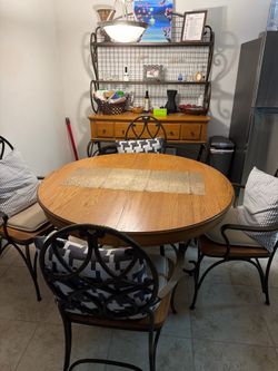 Solid wood and wrought iron dining set