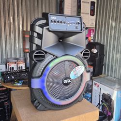 13,000 Watts Bluetooth Speaker With Rechargeable Battery. Microphone And Speaker Stand Included. 