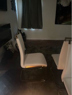 White leather chairs