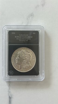 1921 Morgan Dollar and uncirculated