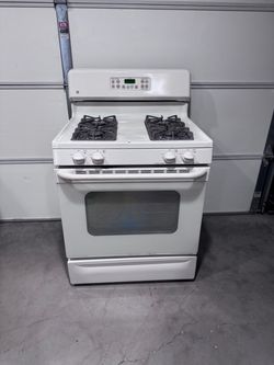 30” GE gas stove and oven.