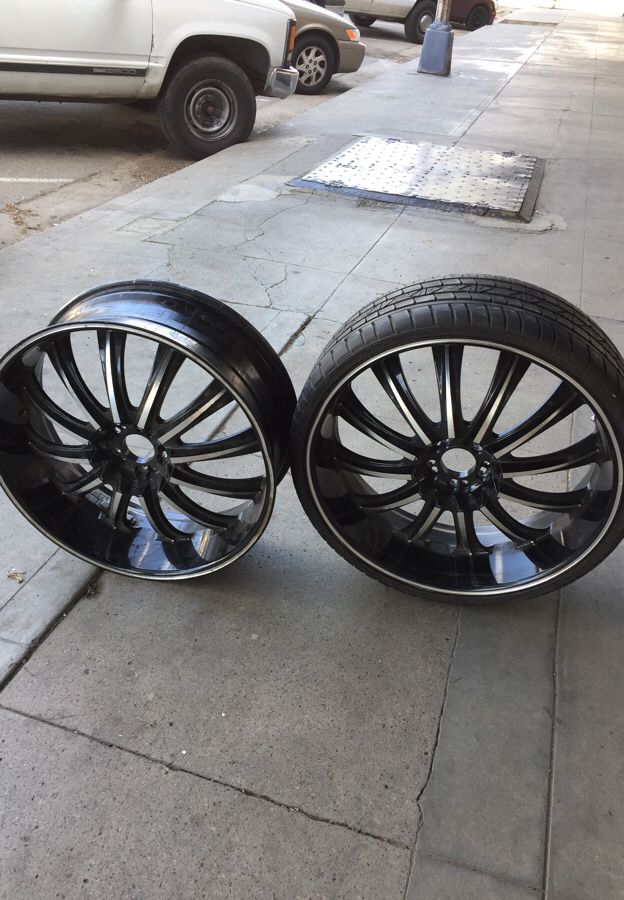 Rims 24 inches two with tires came off a 2001 caddi 500
