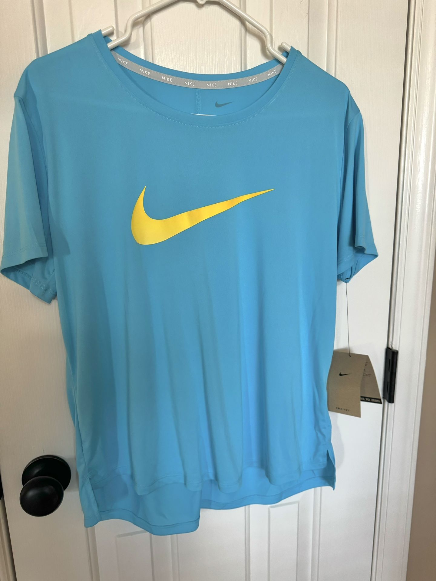 NEW with Tag Ladies size Large Nike Dri-Fit  top.  See More Below!!