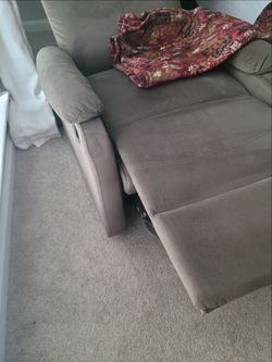 Upholstered small recliner