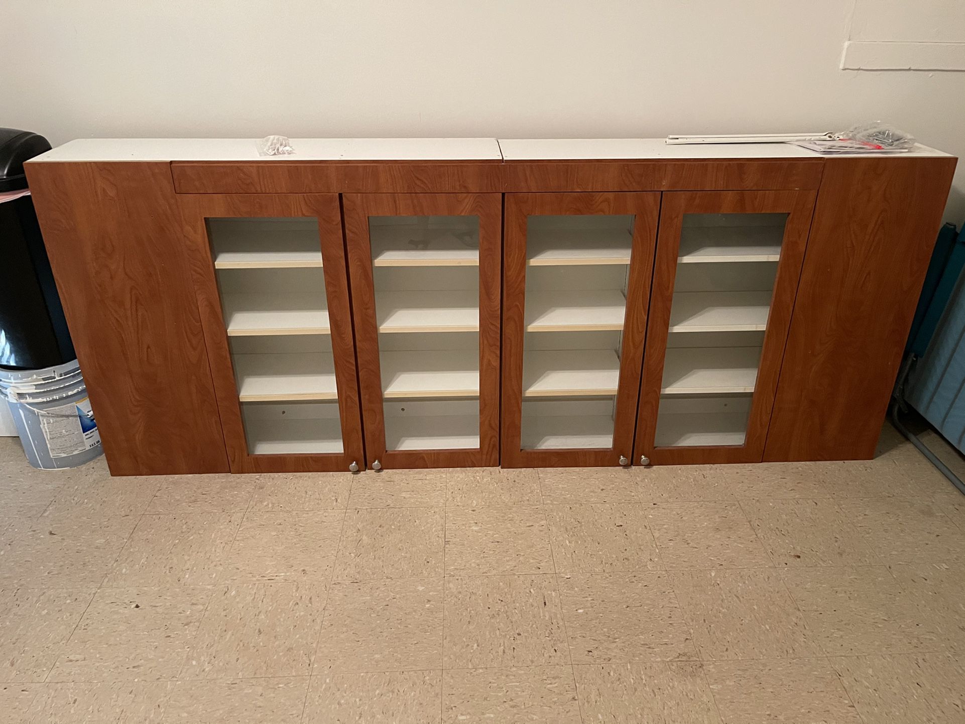 Length 50 ”Height 40” Width 12 5/8 ”wall kitchen cabinets with glass doors price $ 150 per piece I have two available that can be joined $ 300 for bot