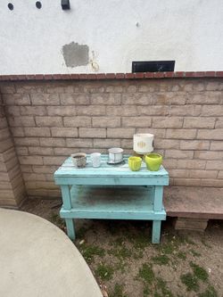 Rustic Potting Table + Planters – Outdoor Garden Set (Woodland Hills)  Description: Selling a charming rustic potting table with a set of planters.  *