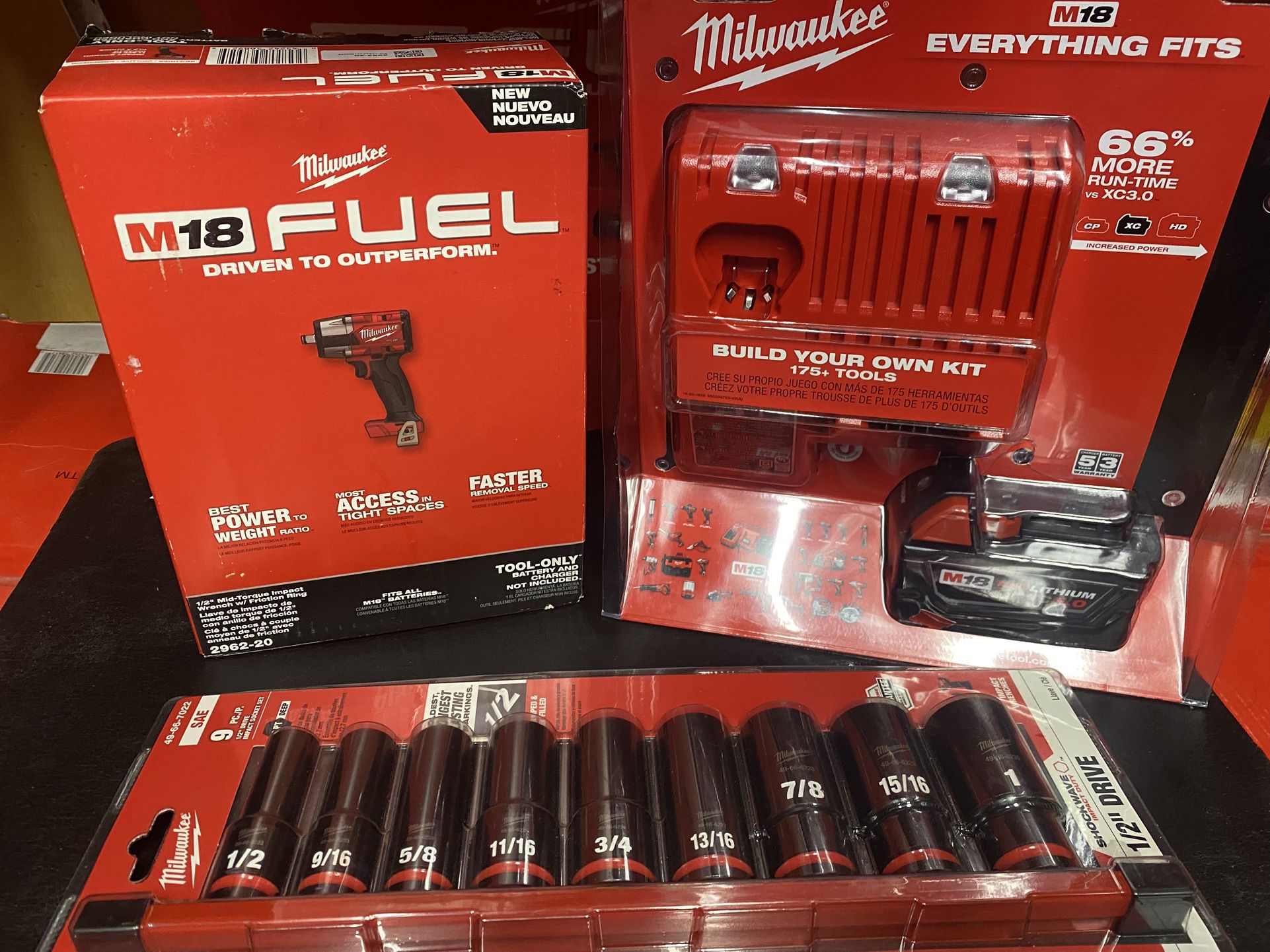 MILWAUKEE M18 FUEL 1/2” MID- TORQUE IMPACT WRENCH AND KIT BATTERY 5.0 And CHARGER PLUS 9 Pc SAE 1/2” DRIVE SOCKET (( Read Below ))