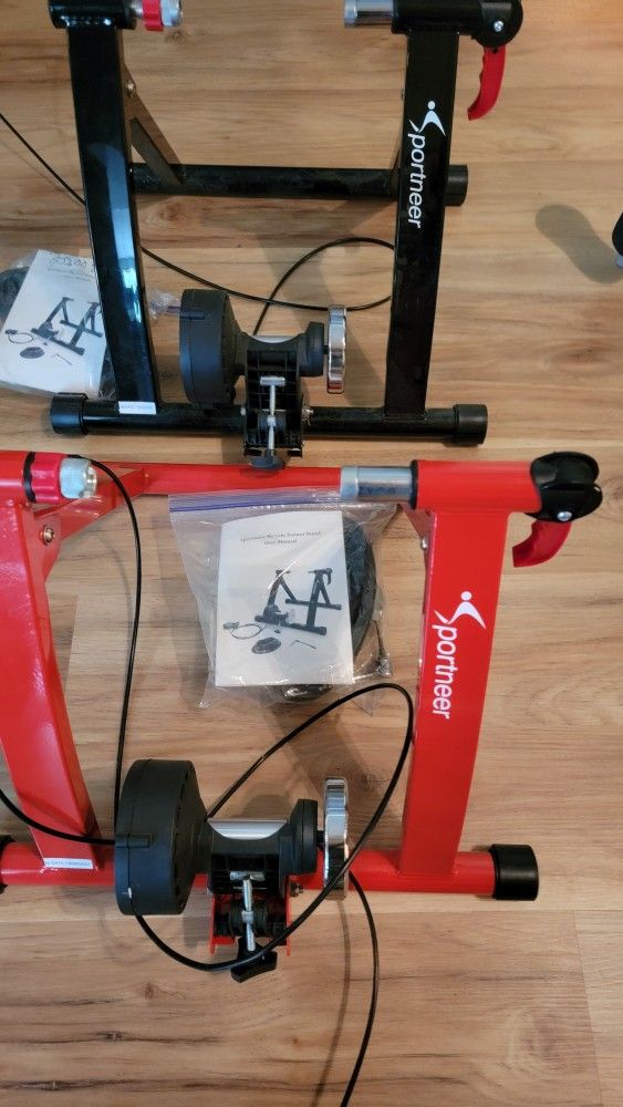 Two SPORTNEER BIKE TRAINERS