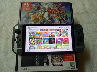NINTENDO SWITCH OLED + 125 POPULAR SWITCH GAMES