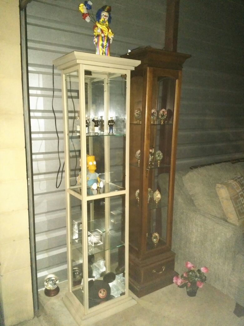 Metal and glass light up curio cabinet for sale