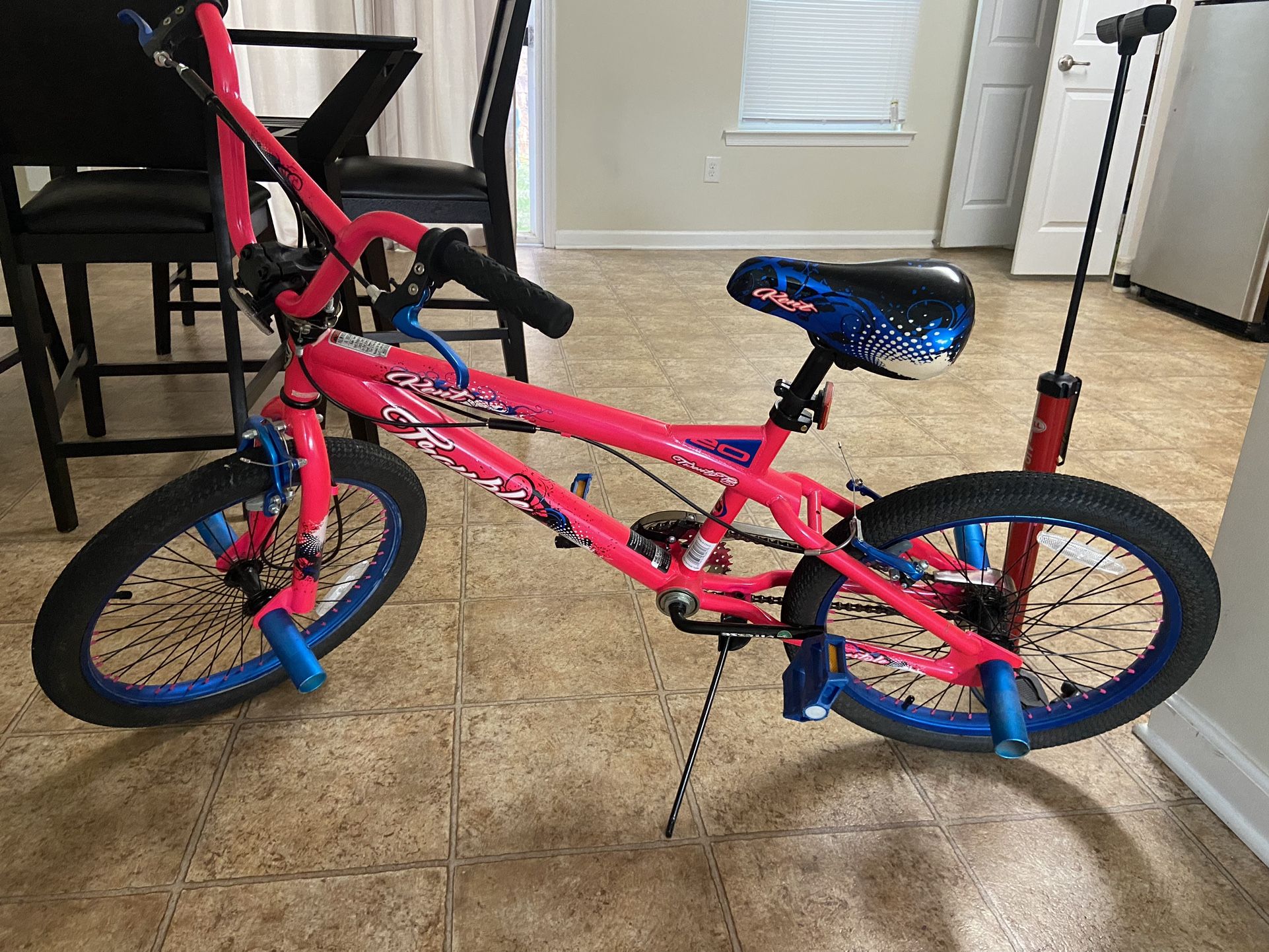 Used Pink Bicycle And Pumper