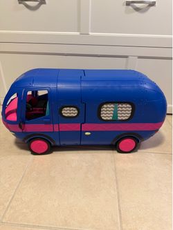 This is an L.O.L. Surprise! O.M.G. 4-in-1 Glamper playset in electric blue