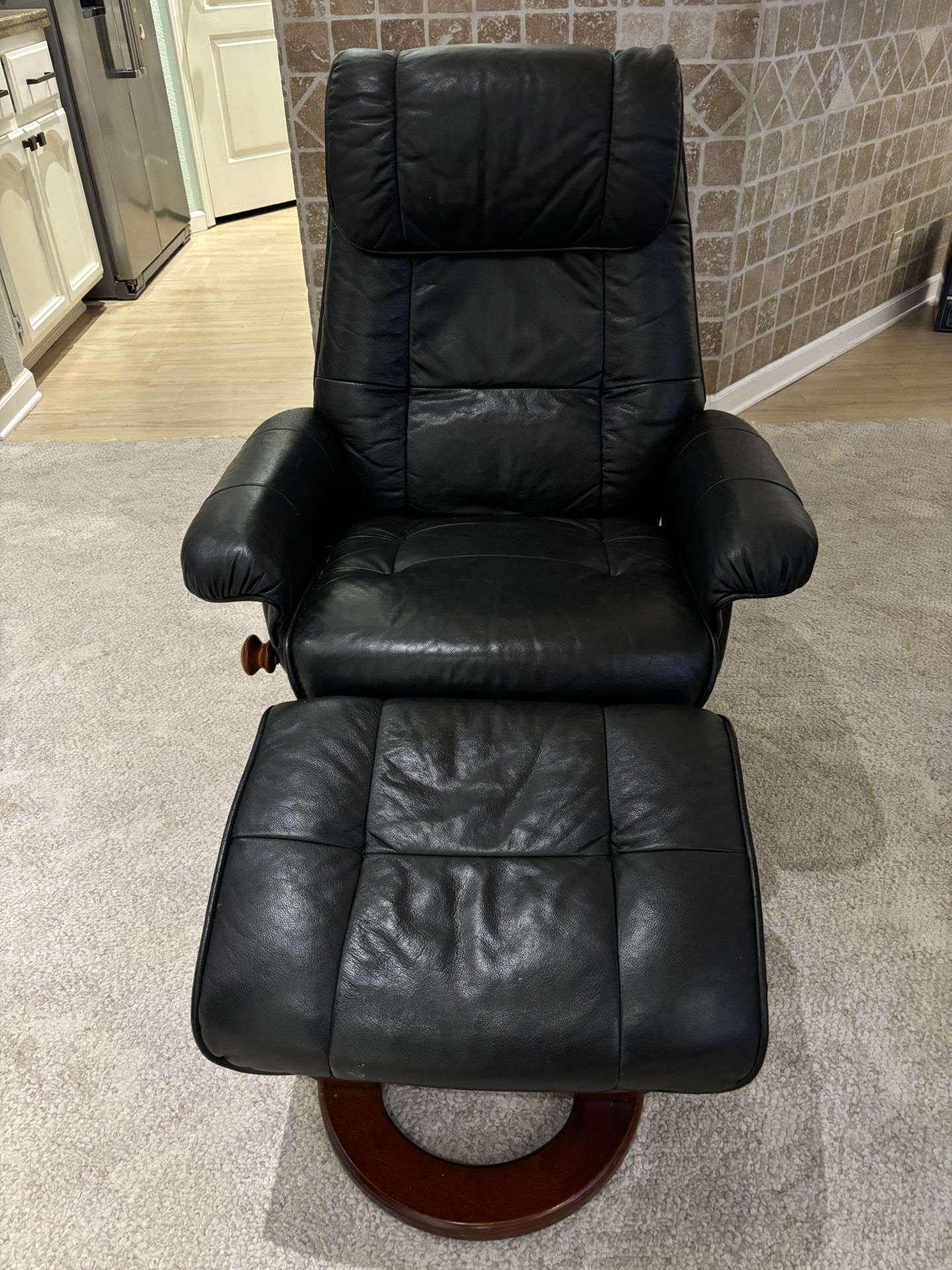 Benchmaster Leather Recliner And Ottoman