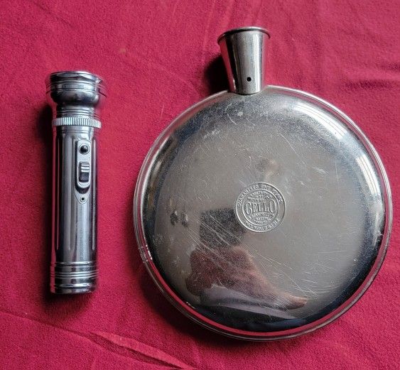 ANTIQUE EVEREADY FLASHLIGHT AND ANTIQUE CELLO HOT WATER BOTTLE FROM 1912 BONDLE OF 2