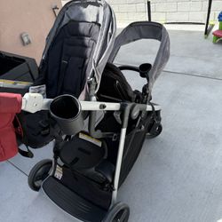 Grey Graco Double Stroller With Momcozy Caddy