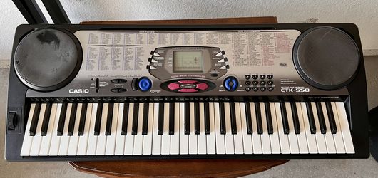 Casio Portable Keyboard w/ Stand - CTK-558