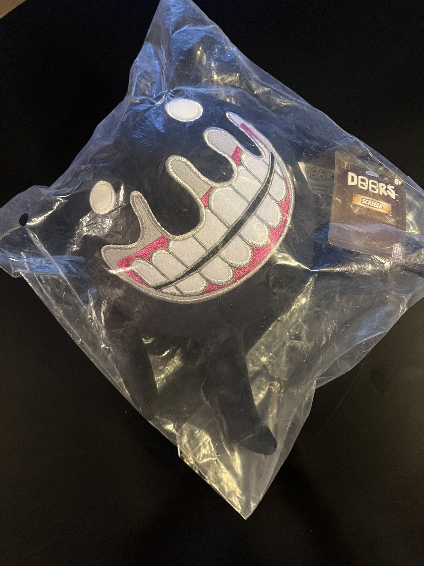 DBRS Black Cartoon Grinning Plush Toy