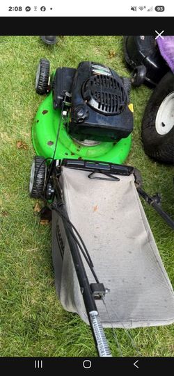 Self propelled mower bagger
