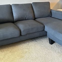 5ft Long Gray L shaped couch 