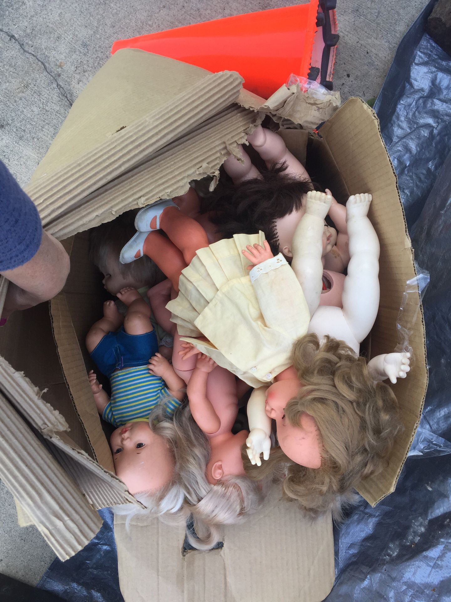 Big box full of antique and vintage, mostly broken baby dolls