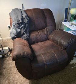Brown leather rocker/recliner