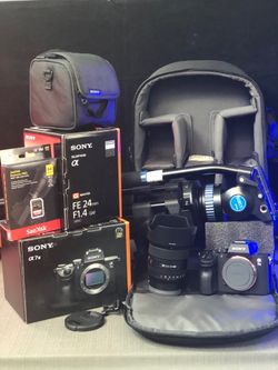 Sony a7 III Mirrorless with FE 24mm f/1.4 GM , tripod, camera Bag and SD Card all new