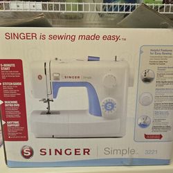 Singer Sewing Machine- Never Used. 