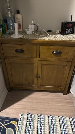 the wooden cabinets