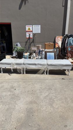 Victoria’s Secret white wood and gray leather padding chair