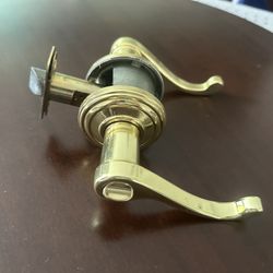 Gold Colored Locking Door Handle