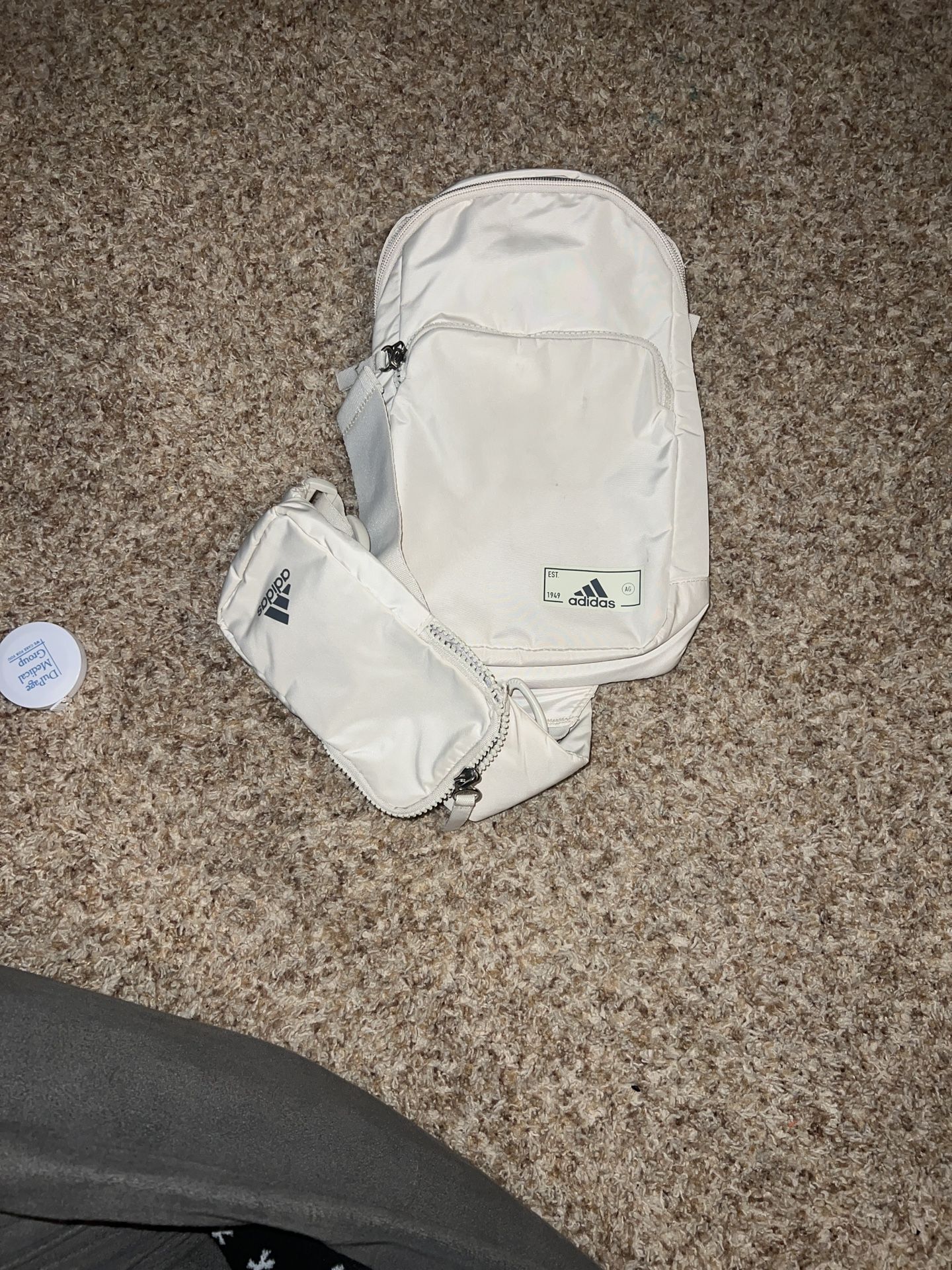 adidas Essentials Sling Crossbody Bag. Used once but has 2 tiny marks on front see pics. Haven’t been treated so they may come out 