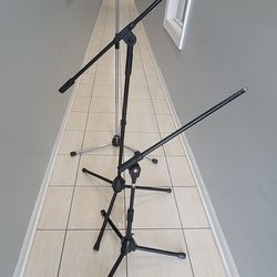 3 MICROPHONE STAND 2 REGULAR AND ONE FOR THE KICK DRUMS.