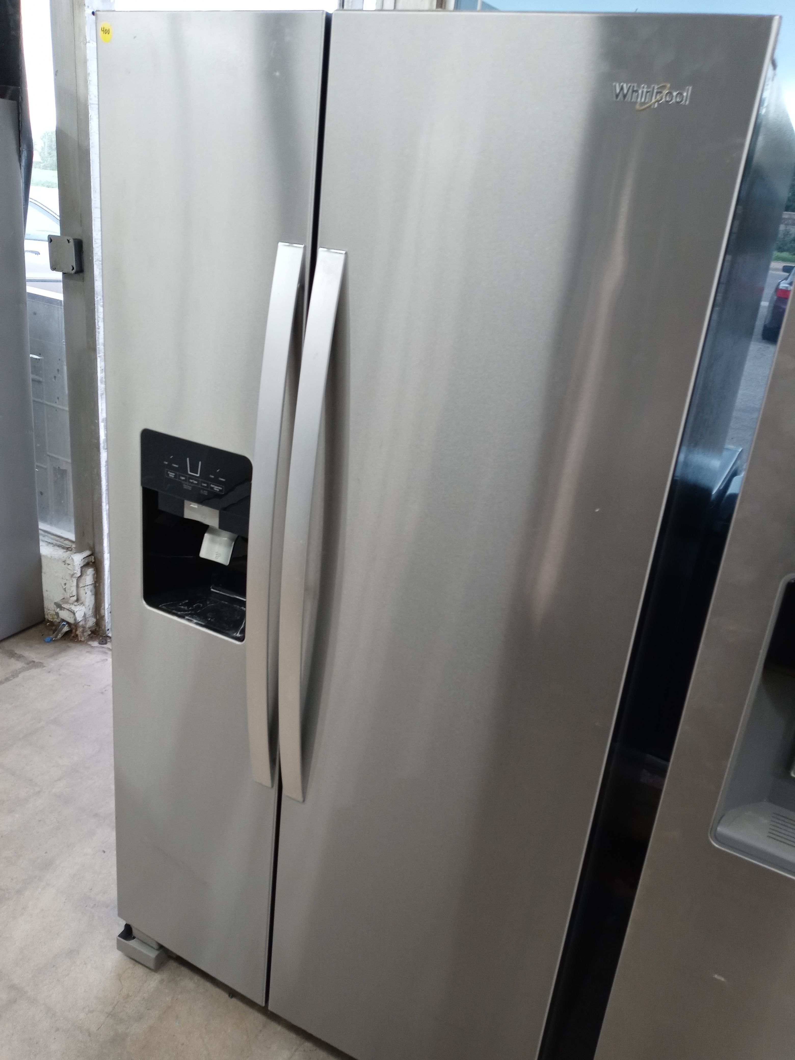 Whirlpool stainless steel side by side refrigerator - Free delivery